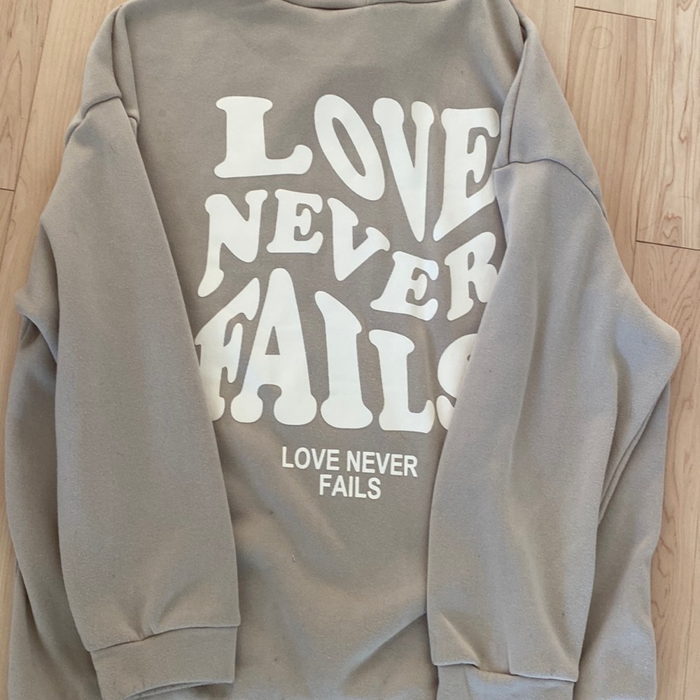 Love Never Fails hoodie